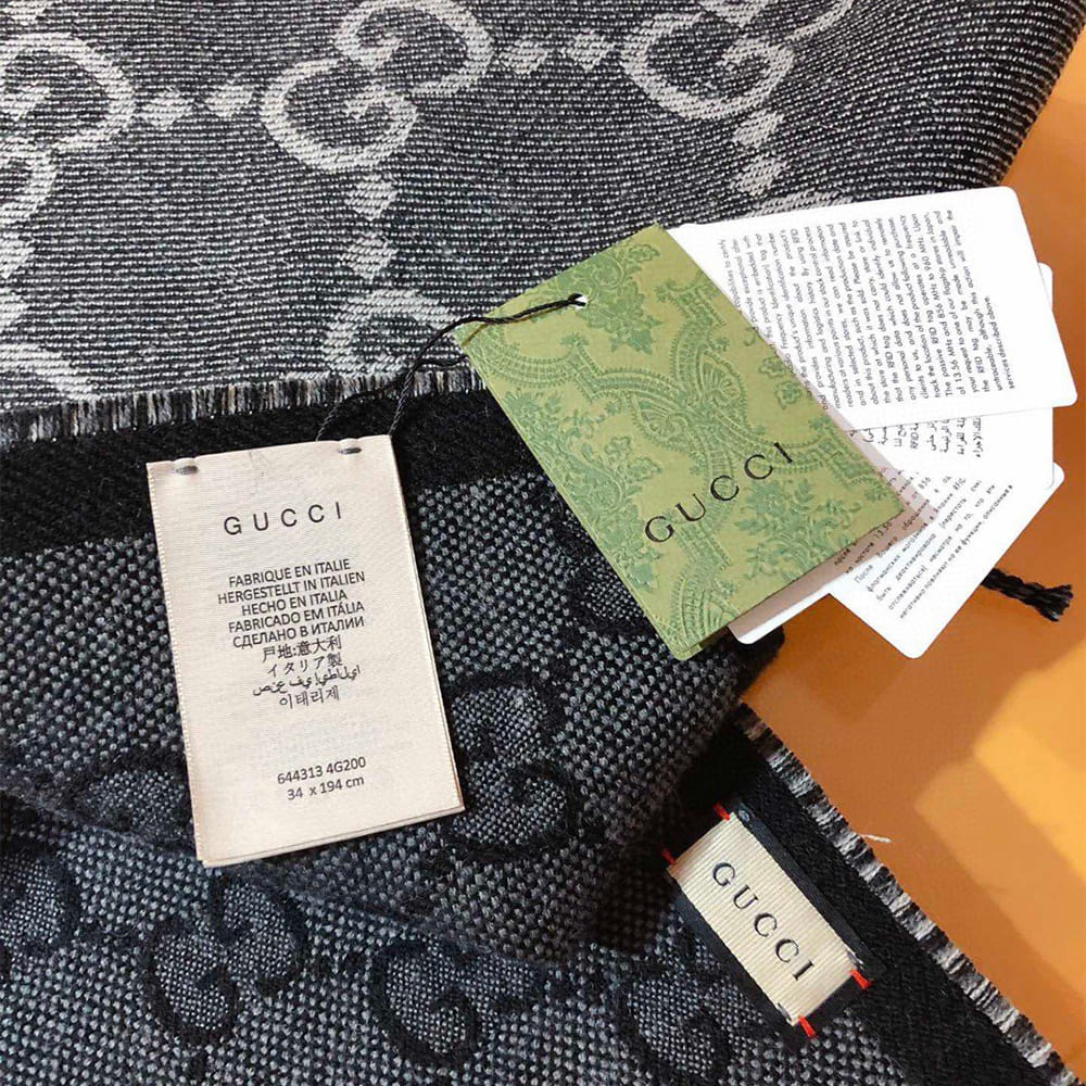 Gv*cl GG jacquard tassel knit scarf