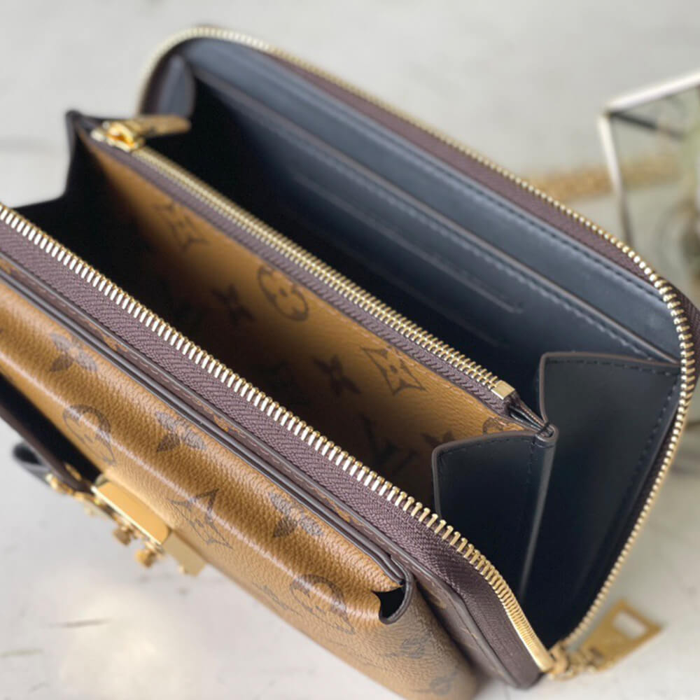 L0vis Vvtt0n Vertical Zippy Wallet Métis