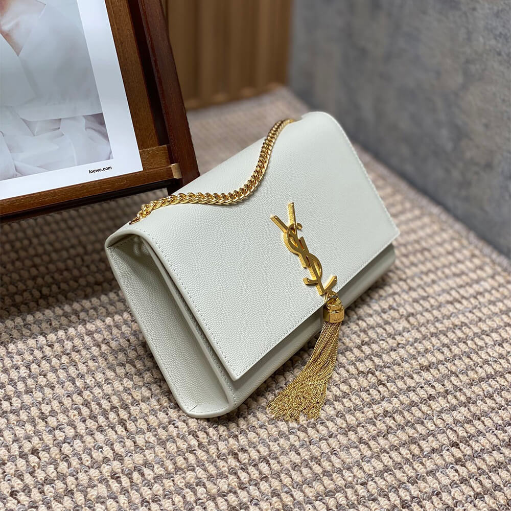 Y51 kate medium tassel in grain de poudre embossed leather